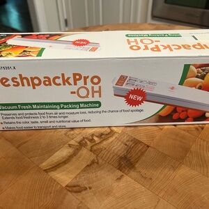 FreshpackPro QH Vacuum Sealer - White and Orange